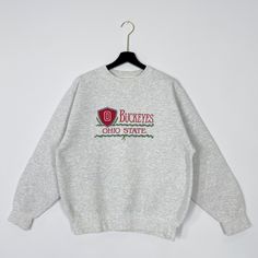 Vintage 90s Ohio State University Sweatshirt Ohio State Crewneck Ohio State Sweater Pullover Ohio State Buckeyes Embroidered Logo Medium Brand Name :- Ohio State University  Tag Size :- Large Recommend Size :- Fits Medium Manual Measurement :- WIDTH (armpit to armpit) :- 23 inches / 58cm LENGTH (shoulder to end of garment) :- 26 inches / 66cm Condition :- Used Good Condition 8/10. Minor Defect Stain Refer Picture.                     - Colors Might Be Different Due To Lighting. DHL EXPRESS = 3-6 Vintage Sweater With Embroidered Logo For College, 90s Embroidered Fall Sweatshirt, 90s Embroidered Sweatshirt For Fall, Vintage Sweater With Embroidered Logo For Fall, Vintage Embroidered Sweater For Fall, Vintage Embroidered Sweatshirt, State Crewneck, University Sweatshirts, Ohio State University