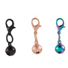 three different types of key chains on a white background, one with a bell and the other with a ball