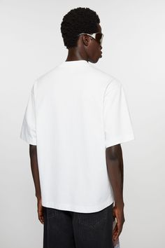 T-shirt is crafted from midweight jersey cotton and detailed with an Acne Studios logo on the centre front. Cut to a relaxed fit. White Relaxed Fit T-shirt With Logo, Logo Detail Short Sleeve T-shirt For Streetwear, Classic Relaxed Fit T-shirt With Logo Print, Sporty Relaxed Fit T-shirt With Embroidered Logo, Basic Relaxed Fit T-shirt With Logo Print, Crew Neck T-shirt With Embroidered Logo For Streetwear, Sporty Cotton Jersey T-shirt With Logo Print, White T-shirt With Logo Detail And Relaxed Fit, Relaxed Fit T-shirt With Logo And Short Sleeves