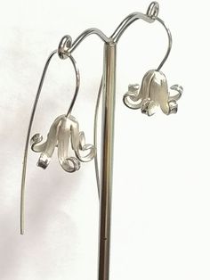 Hyacinth ear drops hand made from Sterling Silver Made in a realistic style  22mm from the piecing to the bottom of the flower and 16mm wide