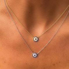 Our dainty blue cz evil eye disc necklace is not only an ancient symbol of protection; but with its cubic zirconia detailing it is an on-trend fashion statement. Evil Eye's are not only said to be lucky but they are also are said to ward off negative energy. That alone sounds good to us. Details:• Round Brilliant Cubic Zirconia Stones• 18k Yellow Gold Plated or Rhodium Plated Sterling Silver • Pendant Size: 9mm• Chain Length: Adjustable 16" to 18" Blue Trendy Jewelry With Delicate Chain, Trendy Adjustable Evil Eye Necklace, Trendy Adjustable Evil Eye Necklaces, Everyday Round Evil Eye Jewelry, Trendy Everyday Evil Eye Jewelry, Dainty Evil Eye Round Pendant Jewelry, Blue Evil Eye Charm Necklace, Blue Sterling Silver Necklace With Diamond Eyes, Everyday Evil Eye Charm Necklace