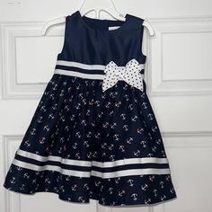 Savannah Baby Girls Nautical Dress 12m Nwt. Complete With Nautical Diaper Cover, Bow And Stripe Detail And Nautical / Anchor Buttons. So Cute! Nautical Navy Cotton Dress, Navy Nautical Cotton Dress, Blue Cotton Sailor Dress, Blue Sailor Cotton Dress, Navy Cotton Nautical Dress, Blue Sailor Style Cotton Dress, Sailor Style Blue Cotton Dress, White Sleeveless Nautical Dress, Cute Navy Sleeveless Dress