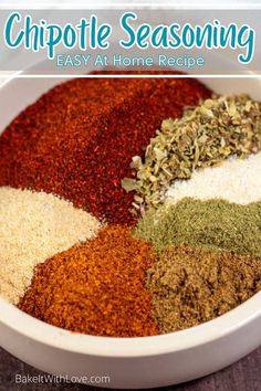 a white bowl filled with spices and seasoning