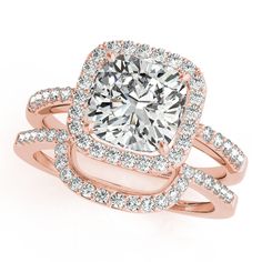 a cushion cut diamond ring with split shans