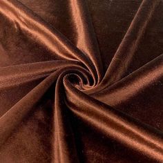 a close up view of a brown velvet fabric with very thin lines on the edges