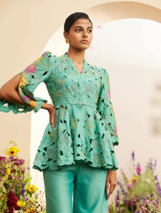 Editor's Note Featuring an aqua chanderi tonal cutwork and beadwork jacket with split sleeves Note: Pants worn by model is for styling purposes and can be purchased separately. Color: Blue Fabric: Chanderi Component: Jacket Occasion: Festive and daywear Care: Dry Clean Only About the Designer Chandrima celebrates diversity in cultures and craft forms creating ready-to-wear women wear for the urban woman of today. The brand embodies the idea of Indian handloom and craft merged with an internation Coord Sets For Women 2024, Co Ords Outfits, Ethnic Design, International Style, Beautiful Dress Designs, Designer Dresses Casual, Indian Bridal Outfits, Simple Pakistani Dresses, Suit Designs