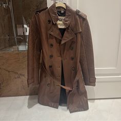 Burberry Coat With Black Buttons. Good Condition. Designer Brown Leather Jacket For Business, Luxury Brown Outerwear For Business, Luxury Brown Business Outerwear, Luxury Brown Leather Jacket For Work, Luxury Brown Leather Jacket For Fall, Designer Brown Leather Jacket For Work, Designer Fitted Brown Leather Jacket, Luxury Brown Long Coat, Fitted Designer Brown Leather Jacket