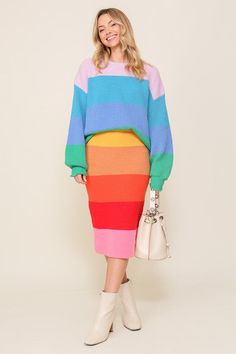 Elevate your style with our Bold Rainbow Stripe Oversized Chunky Knit Pullover. This eye-catching and playful pullover boasts a unique rainbow stripe design that's sure to turn heads. The drop shoulder and oversized fit provide a relaxed and comfortable feel, while the ribbed knit adds a cozy and warm texture, making it perfect for chilly days. With its classic round neckline, this pullover is easy to style with any bottom, whether it's jeans or skirts. Crafted from high-quality and soft knit ma Midi Sweater Skirt, Multicolor Skirt, Casual Night Out, Cozy Knit, Bold Stripes, Shoes With Jeans, Knit Pullover, Matching Top, China Fashion