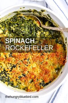 spinach and rocketfler casserole in a white bowl with a spoon