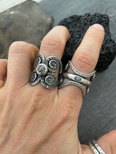 You can choose between 4 different and unique sterling silver rings. Each has a different style and design, but all are perfect for your day by day outfits and super comfy and easy to match with other accessories and any outfit. In one of the pictures you can see a number that represents each ring for you to choose from. Ring #1- Size 8.75, can be open to a bigger size but this will create a gap in the front. And the ring is 2.7cm- 1.10 inch long Ring #2- Size 8.5 , can be open to a bigger size Unique Stackable Wide Band Sterling Silver Rings, Unique Sterling Silver Wide Band Ring, Unique Wide Band Sterling Silver Ring, Unique Adjustable Sterling Silver Wide Band Ring, Unique Adjustable Wide Band Sterling Silver Ring, Unique Oxidized Wide Band Rings, Unique Silver Wide Band Ring Gift, Handmade Sterling Silver Wide Band Open Ring, Silver Rings With Unique Variations For Anniversary