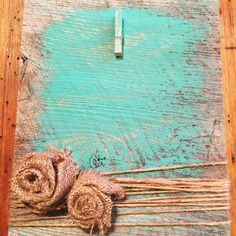 some twine on top of a wooden board