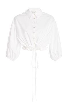 The Hutton Blouse is the classic top, re-imagined. The cropped silhouette and drawstring hem add an extra dose of glamour to this everyday staple. The airy, lightweight cotton pairs well with high-waisted trousers and slinky skirts. Product Details 100% cotton poplin. Drawstring hemline. Cropped silhouette. Covered buttons. Made in the USA. Care Instructions Dry-clean or hand wash cold. Size & Fit This item fits true to size. Shipping Details Please allow 5-7 days for standard delivery. Return P French Florist, Hemant And Nandita, Graphic Floral, Easy Work, Drawstring Top, Collar Top, High Waisted Trousers, White Blouse, Covered Buttons