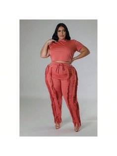 Elevate your wardrobe with our Crop Top Two-Piece Set in Salmon, a versatile and stylish ensemble that combines modern flair with comfort. Crafted from a blend of 95% polyester and 5% spandex, this set offers a soft, stretchy feel for effortless wear.

Key Features:
- Fabric: Made from 95% polyester and 5% spandex, ensuring comfort and flexibility.
- Fit: Features a crop top with a round neck and short sleeves, paired with high-waisted pants.
- Color Options: Available in vibrant Salmon.
- Sizes Pants Color, Two Piece Sets, Chic Design, High Waisted Pants, Plus Clothing, Everyday Look, Formal Event, All Fashion, Color Options