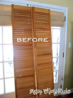 two wooden shutters open in front of a door