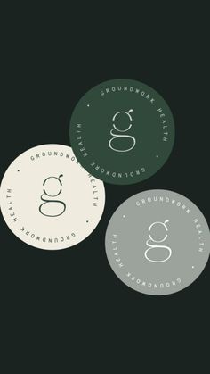 three circular labels with the words gourmet and grundhorn in white on a black background