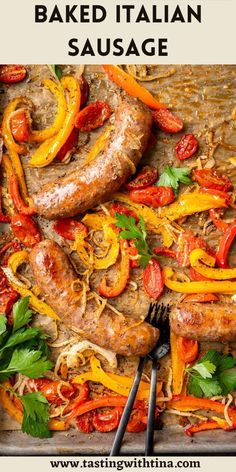 baked italian sausage with peppers and tomatoes on a baking sheet