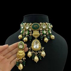 Gorgeous Sabyasachi inspired Gorgeous Necklace with matching earringsSet Eith Semi Precious Stones Strings Highest quality Doublet Stones used. Fine quality and craftsmanship. Perfect for desi weddings. Necklace comes in drawstring cord therefore adjustable Earrings Have Push backs.  Customized orders takes 3 to 4 weeks, depending on piece requirements. The Ombre Designs Jewelry pieces can be customized in accordance with your requirement. Please Email or Whats app on : +91 8448833193 / sonalikamehra [!at] theombredesigns.com Designer Gold Kundan Necklace For Festive Occasions, Festive Designer Gold Kundan Necklace, Designer Chandbali Jewelry For Festivals, Designer Chandbali Jewelry For Festive Occasions, Designer Meenakari Chandbali Jewelry, Designer Festive Chandbali Jewelry, Designer Kundan Necklace For Festivals, Designer Kundan Necklace With Meenakari For Festivals, Festive Designer Kundan Necklace With Meenakari