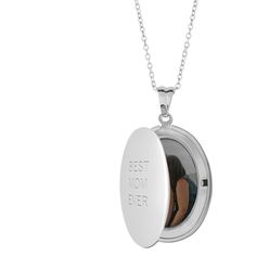 Made of stainless steel, with your choice of silver, gold or rose gold finish. Oval Locket measures 1.2 x 0.9, photo insert measures 0.9 x 0.6. Heart Locket measures 1.07 x 1.09, photo insert measures 0.8 x.85. Engraving available on front side only. Photos already sized and inserted inside. Comes with 18 coordinating chain and gift box. Imported. Personalized in USA Oval Silver Stainless Steel Necklace, Oval Link Stainless Steel Necklaces For Gifts, Stainless Steel Oval Link Necklaces As Gift, Stainless Steel Oval Link Necklace As Gift, Stainless Steel Oval Link Necklace For Gifts, Silver Locket Necklace With Engraving For Mother's Day, Customizable Round Silver Locket Necklace, Mother's Day Silver Locket Necklace With Engraving, Personalized Oval Stainless Steel Jewelry