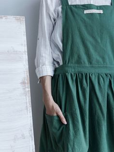 Pleated aprons have always been a favorite of girls. Washed cotton is often used in home textiles because of its soft and comfortable characteristics. This apron offers comfort and quality. Side pockets for tools or kitchen utensils make this apron perfect for everyday use. Size: Total length 100CM (39 inches), hem width 134CM (53 inches) 100% Cotton 2 patch pockets Square neck Pleated design Machine wash cold Coveralls Mens, Men Jumpsuit, Overalls Men, Mens Overalls, Vest Style, Cotton Apron, Flower Arranging, Vest Fashion, Overalls Women