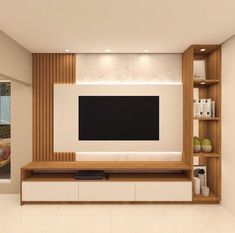 a modern living room with white walls and wooden entertainment center, built in bookshelves