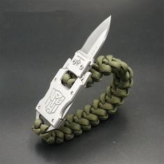 a paracorine bracelet with a knife on it