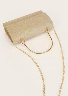 This Glitter Flap Square Dinner Bag is the perfect accessory for any formal event. The shimmering glitter adds a touch of elegance, while the detachable shoulder strap chain provides versatility. Made with durable polyester, this mini bag is both stylish and functional. Available in gold. Gold Bag With Detachable Strap For Night Out, Party Clutch Shoulder Bag With Gold-tone Hardware, Gold Rectangular Bag For Gala, Elegant Gold Bag With Glitter, Gold Evening Bag With Gold-tone Hardware For Gala, Elegant Gold Glitter Bag, Elegant Gold Glitter Bags, Glamorous Gold Evening Bag With Glitter, Glamorous Gold Glitter Evening Bag