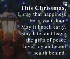 a christmas card with a light postcard saying,'this christmas, i pray that happiness be at your door may it knock early, stay late, and leave the gifts of peace love, joy and good