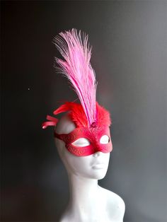 This masquerade mask boasts a whimsical flamingo design, evoking the spirit of the tropics and adding a touch of playfulness to your ensemble. Delicate feathers sprout from the mask, creating an aura of exotic elegance and grace. Whether you're attending a tropical-themed masquerade ball, or simply looking to make a dramatic entrance, this mask ensures you'll be the center of attention.


Age Group/Gender - Adult/Women

Size/Type - One size fits all adults

Mask Color - Pink

Mask Material - Pol Flamingo Mask, Pink Masquerade, Flamingo Feather, Masquerade Mask Women, Dramatic Entrance, Metal Mask, Feather Mask, Flamingo Design, Pink Mask