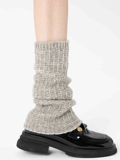 Embrace the chill of autumn and winter with these delightful leg warmers, available in classic shades of white, black, and gray. Crafted from a soft, cozy knit, these leg warmers are designed to keep you warm and stylish all season long. Soft Beige Socks For Fall, Beige Mid-calf Socks For Fall, Mid-calf Beige Socks For Fall, Soft Beige Winter Socks, Soft Gray Winter Socks, Gray Mid-calf Socks For Fall, Soft Trendy Socks For Fall, Warm Beige Socks For Winter, Cozy Beige Socks For Winter