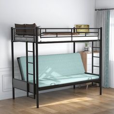 a bunk bed with a futon underneath it in a room next to a window