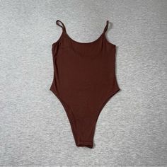 Brand New Without Tags Color Brown Size Medium Ribbed Low Back Bodysuit With Clips Basic Essential Casual Solid Stretch One Piece, Casual Fitted Solid One Pieces, Casual Solid Stretch One-piece, Casual Solid Color Stretch One-piece, Summer Brown Lined Bodysuit, Casual Solid One-piece Bodysuit, Casual Solid Color One-piece Bodysuit, Brown Stretch Summer Bodysuit, Summer Brown Stretch Bodysuit