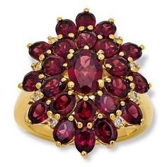 Colleen Lopez Rhodolite Garnet and White Zircon Starburst Ring  Crafted from gold-plated sterling silver, this beautiful starburst-shaped ring features a cluster of rich, rhodolite garnets with sparkling, white zircon accents. Perfect for stylish, everyday wear, this pretty piece will elevate the look of any ensemble!       Approx. 1"L x 3/4"W x 5/16"H; shank 1/16*W     Stamped .925; yellow gold-plating   Stone Information       All sizes and weights approximate     Total Carat Weight: 5.19ct Starburst Ring, Color Bands, Ring Crafts, Rhodolite Garnet, Size 10 Rings, Gold Plated Sterling Silver, Gold Plating, Garnet, Gemstone Jewelry