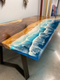 a table with blue and white paint on it