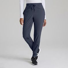 These women's barco one jogger-style scrub pants always find their way to the top of the pile. Lightweight, moisture-wicking fabric floats above your skin for a barely-there feel. Four-way stretch lets you move freely when the pace picks up. It's made with the equivalent of five recycled bottles per garment to help protect the planet we share.3 pockets totalElastic waist with drawcordMid-riseJogger leg with ribbed cuffsPerforated blocking on legSide seam pockets and a side cargo pocketFour-way s Relaxed Fit Straight Leg Activewear With Pockets, Athleisure Activewear With Straight Leg And Pockets, Utility Sports Bottoms With Hip Pockets, Sports Bottoms With Pockets And Straight Leg, Straight Leg Sports Bottoms With Pockets, Relaxed Fit Activewear With Pockets, Sports Tapered Leg Cargo Pants With Pockets, Sports Cargo Pants With Tapered Leg And Pockets, Sports Pants With Pockets And Tapered Leg