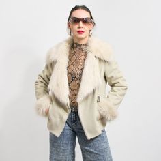 Vintage faux suede jacket with faux fur lining, collar and cuffs - materials: faux fur, faux suede SIZE size from label: no label best fits women: XL MEASUREMENTS bust: 44 inches (112 cm) length: 24 inches (61 cm) sleeve length from the shoulder seam: 24 inches (61 cm) The model is 5'9" (174 cm), measures 35-27-38 (90-69-96 cm) and typically wears clothing in size M CONDITION - 9/10 - The jacket in great pre-owned vintage condition Faux Fur Leather Jacket For Cold Weather, Suede Fur Coat For Fall, Shearling Fur Coat With Faux Fur Trim For Fall, Long Sleeve Suede Fur Coat For Winter, Winter Suede Fur Coat With Long Sleeves, Winter Suede Leather Jacket With Long Sleeves, Suede Outerwear With Faux Fur Lining And Long Sleeves, Winter Suede Fur Coat With Faux Fur Lining, Cold Weather Faux Fur Leather Jacket