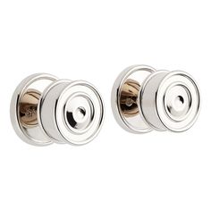 two chrome door knobs with round handles