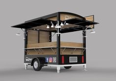 the food truck is designed to look like it's made out of wood and metal