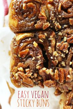 some very tasty looking food on top of a white plate with pecans and nuts