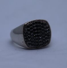 This beautiful Excellent Looking 15x15mm Signet Mens Pave Black Diamonds Ring is perfect for Engagement, Wedding, or Anniversary Celebration! The ring comes with simulated 1.62ct diamond paved in 925 Sterling Silver. Material: Oxidized 925 Sterling  Silver Gem: 2.43ct simulated Pave Diamonds Ring head size 15x15mm Albion  Please look at all pictures for details as this is the actual ring you are buying. Luxury Round Signet Ring With Pave Setting, Black Signet Ring With Diamond Accents, Black Sterling Silver Signet Ring With Polished Finish, Black Sterling Silver Hallmarked Signet Ring, Black Sterling Silver Signet Ring For Collectors, Pave Diamond Ring, Black Diamond Ring, Cross Pendant Necklace, Pinky Ring