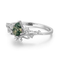 Our Lotus Moss Agate Ring© symbolizes courage and resilience. With beauty that speaks for itself, this stunning pear-shaped moss agate sits at the center of whimsical vines with glistening accents. May this nature-inspired masterpiece encourage you to bloom brilliantly no matter how muddy life may be. ✦ Available in both 14K white gold vermeil (14K white gold plated over a sterling silver base) and 10K solid white gold. Bff Rings, Moss Agate Ring, Vintage Diamond Rings, Ring White Gold, Agate Ring, White Gold Ring, Shop Engagement Rings, Engagement Ring Wedding Band, White Ring