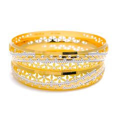 Elevate your style with our Upscale Decadent Bangle Pair. Crafted from 22k gold with a weight of 51.9 grams and a gorgeous finish of yellow and white gold, these bangles are a statement piece. With a size of 2.8 and an opening diameter of 2.5," this set of two bangles will add a touch of luxury to any outfit. PRODUCT DETAILS Gold Purity(karat): 22k Gold Weight(grams): 51.9 Item Finish: Yellow + White Gold Bangle Size: 2.8 Bangle Opening(diameter): 2.5" Number Of Pieces: 2 Bangles Festive 22k Yellow Gold Bangle, White Bangle With Intricate Design For Formal Occasions, Festive Yellow Gold Round Bangle, Festive Yellow Gold Bangle, 22k Gold Filigree Bangle Bracelet, Hand Set Yellow Gold Bangle, Gold Fusion Bracelet For Anniversary, Wedding Diamond Cut Yellow Gold Bangle, Elegant Yellow Gold Round Bangle