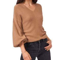 Mild Oak Knit Tops For Casual Gatherings In Fall, Fall Knit Tops With Balloon Sleeves, Casual Balloon Sleeve Sweater For Fall, Knit Tops With Balloon Sleeves For Fall, Fall Balloon Sleeve Knit Tops, Casual Balloon Sleeve Spring Sweater, Fall V-neck Tops For Casual Gatherings, Casual Balloon Sleeve Tops, Casual Brown V-neck Sweater For Spring