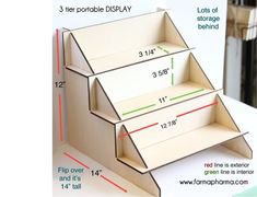 an open cardboard display case with measurements for the bottom and top drawers on each side