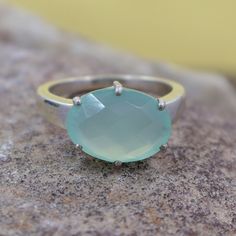 Aqua Chalcedony silver Ring / Prong Set Oval Shape Gemstone Ring / Chalcedony Ring / 925 Sterling Silver Ring / Gift for Her / Wedding Ring Product / Item Details:  Product Type: Ring Product Quantity: 1 Ring Used Metal: 925 Sterling Silver Metal Purity: Solid 925 Metal Color: Silver Gemstone Size: 10x14mm Oval Shape Product Weight: 4.100 grams Approx Listing is For One (1 item) All are designed and handmade by me and my team with precision, Perfect craftsmanship and strong interest! We are continuously adding new products in our etsy shop, So please keep coming back to see more great deals on jewelry in our store! For Wholesale orders or custom made order requirements, please feel free to contact me! Thank you so much for visiting! Her Wedding Ring, Chalcedony Ring, Etsy Wedding Rings, Aqua Chalcedony, Gemstone Ring, Rings Statement, 925 Sterling Silver Ring, Oval Shape, Ring Gift