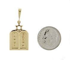 14K Yellow Gold Ten Commandments Tablets Star of David Torah Pendant Charm Metal: 14k Gold Charm Length: approximately 31mm (1.22 inches) including bail Charm Width: approximately 14mm (0.55 inch) This is 14k Gold. Not gold plated. Not gold filled. Note: Images may be enlarged to show details. Please refer to the actual measurement of this item Necklace chain is sold separately. Star Of David Pendant, Ten Commandments, Torah, Star Of David, Gold Charm, Necklace Chain, Dog Tag Necklace, Chains Necklace, Gold Filled