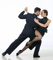 a man and woman are dancing together on a white background with their arms around each other