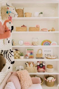 the shelves are filled with stuffed animals and toys