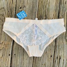 Size M Nwt White Lace String Bottoms, Cream Lace Trim Briefs, Spring Delicate Lace Brief Bottoms, Cream Lace Brief Bottoms, White Lace Loungewear Bottoms, Feminine Sheer White Bottoms, White Feminine Lace Bottoms, Feminine White Lace Bottoms, White Lace Brief Bottoms