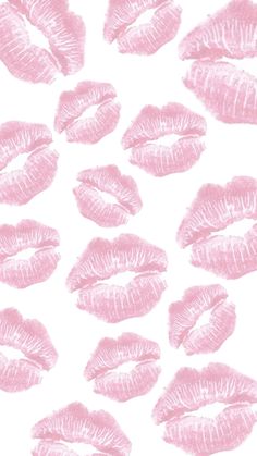 pink lipstick kisses on a white background