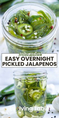 two jars filled with pickled jalapenos on top of a table